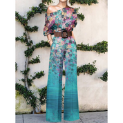 Anna | Off-shoulder jumpsuit met bloemenprint in de kleur Blauw voor dames in Party stijl ideaal voor de zomer.