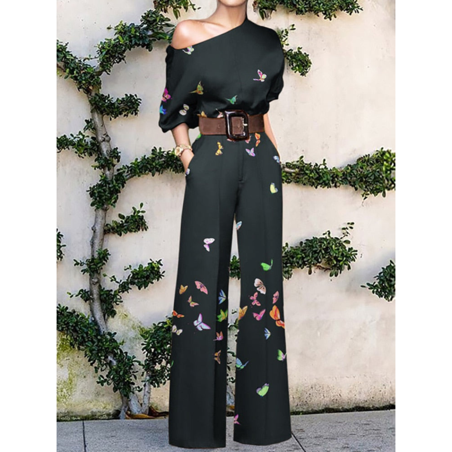 Anna | Off-shoulder jumpsuit met bloemenprint in de kleur Zwart voor dames in Party stijl ideaal voor de zomer.