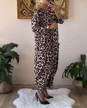 Aritia | Elegante Jurk met zakken en luipaardprint in de kleur Zwart voor dames in stijl ideaal voor de herfst.