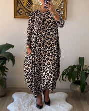 Aritia | Elegante Jurk met zakken en luipaardprint in de kleur Zwart voor dames in stijl ideaal voor de herfst.