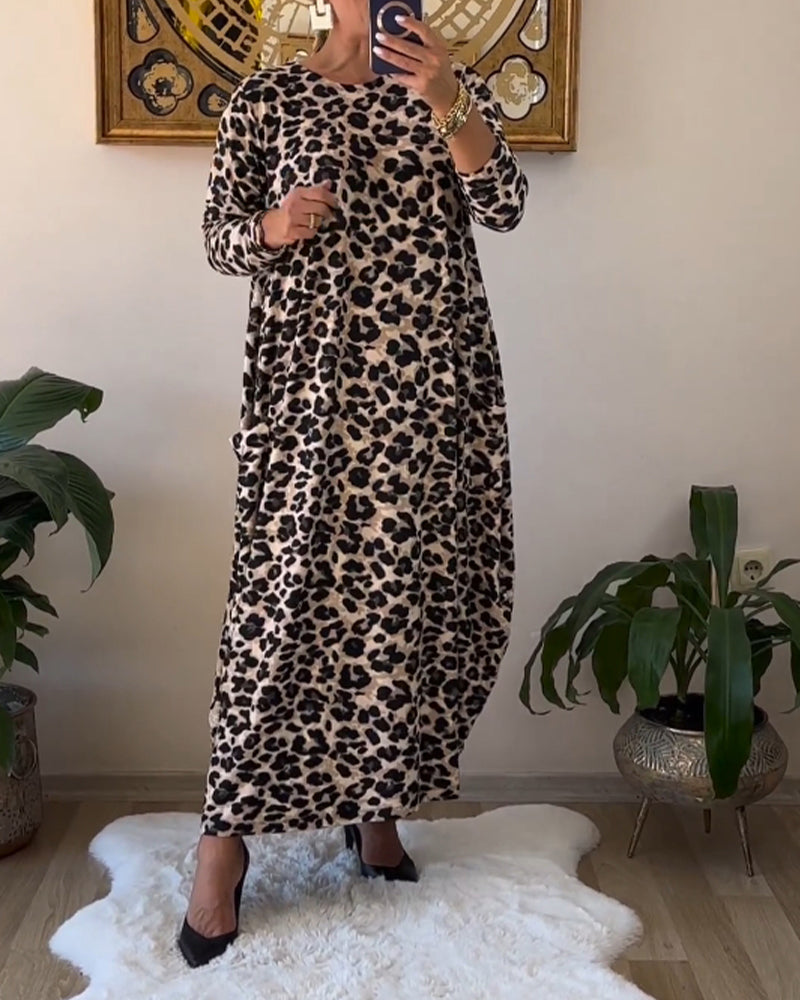 Aritia | Elegante Jurk met zakken en luipaardprint in de kleur Zwart voor dames in stijl ideaal voor de herfst.