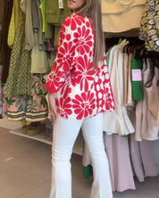 Blouse met bloemen en revers in de kleur Rood/Wit voor dames in stijl ideaal voor de lente.