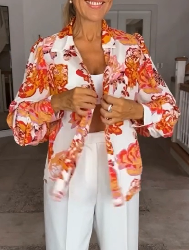 Blouse met bloemenprint en V-hals in de kleur Bloemen voor dames in stijl ideaal voor de herfst.