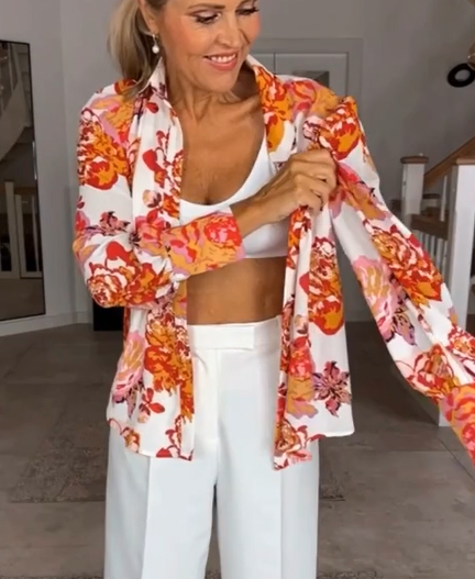 Blouse met bloemenprint en V-hals in de kleur Bloemen voor dames in stijl ideaal voor de herfst.