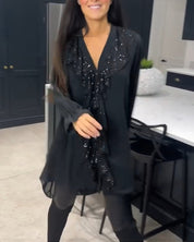 Blouse met ruches en elegante stijl in de kleur Zwart voor dames in stijl ideaal voor de herfst.