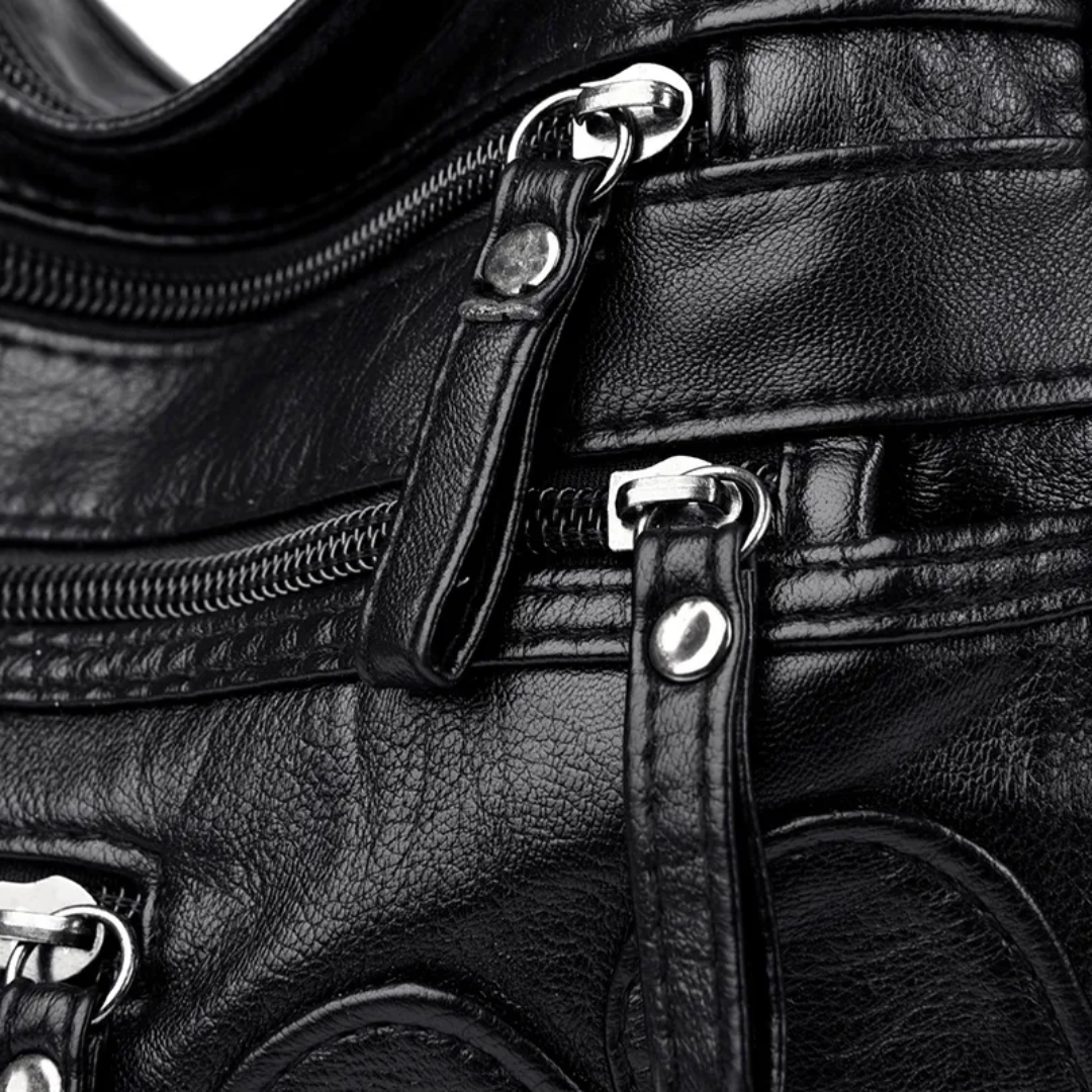 Carly Messenger Tas | Praktisch & vintage in de kleur Zwart voor dames in stijl geschikt voor alle seizoenen.