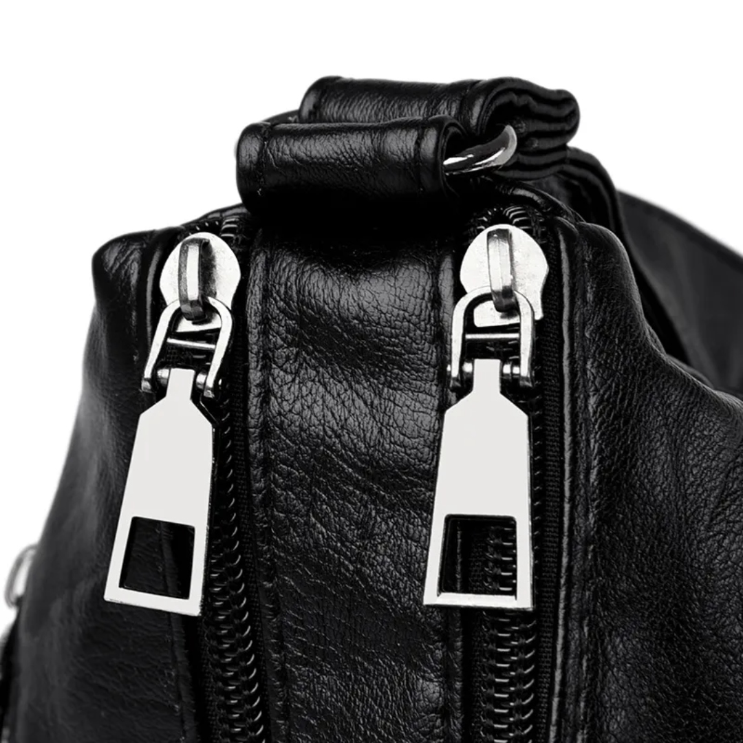 Carly Messenger Tas | Praktisch & vintage in de kleur Zwart voor dames in stijl geschikt voor alle seizoenen.