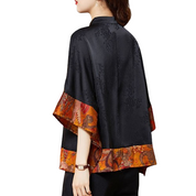 Chryssi | Fris en fruitig zomerjurkje in de kleur Zwart voor dames in stijl ideaal voor de lente.