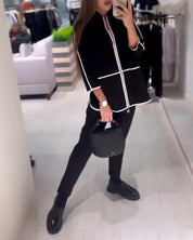 Contrast Coat met rits in de kleur Zwart voor dames in stijl ideaal voor de herfst.