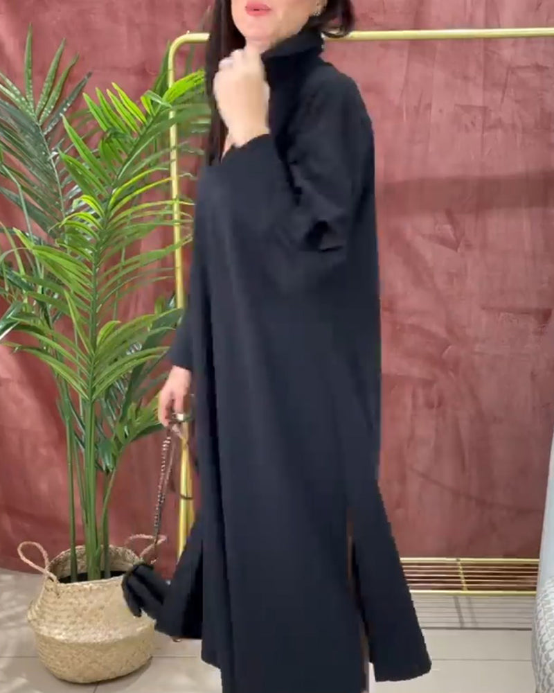 Effen jurk met V-hals, lantaarnmouw en zijsplit in de kleur Zwart voor dames in stijl ideaal voor de herfst.