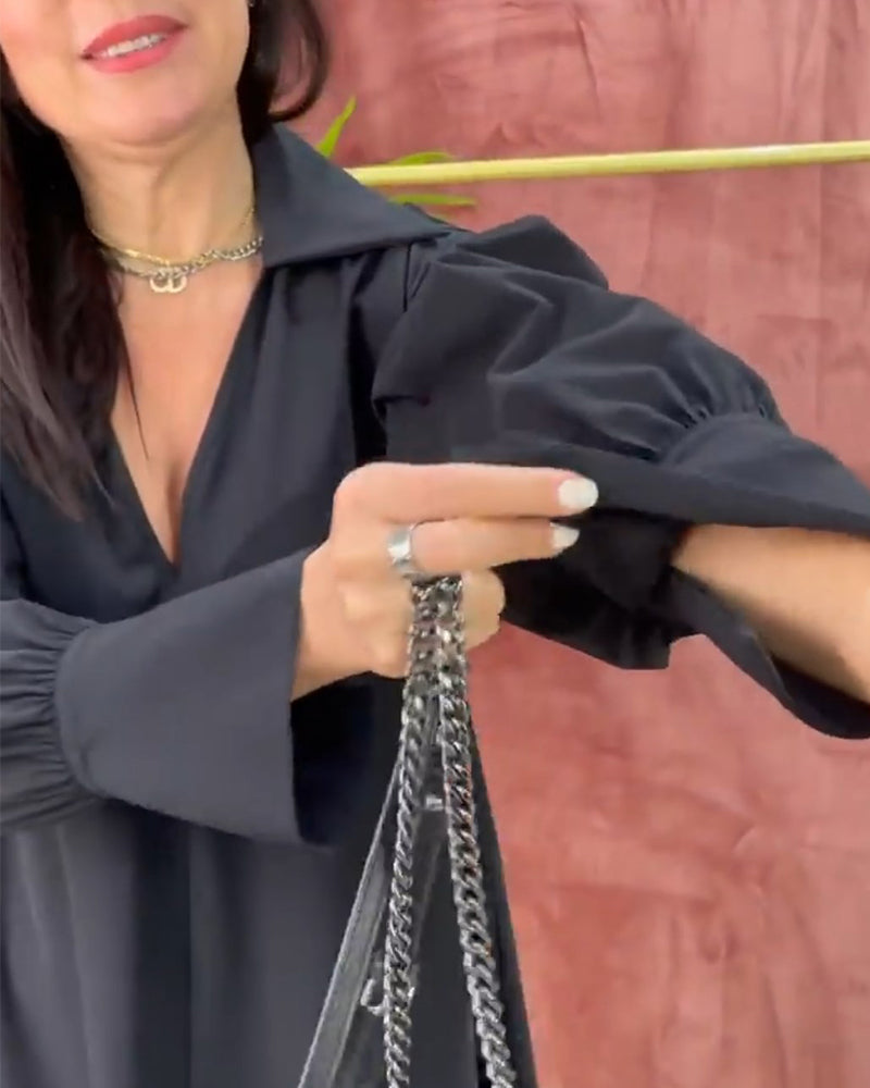 Effen jurk met V-hals, lantaarnmouw en zijsplit in de kleur Zwart voor dames in stijl ideaal voor de herfst.