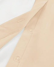 Effen kleur elegant geplooid overhemd in de kleur Beige voor dames in stijl ideaal voor de herfst.