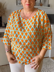 Elegant kleurvol herfstblousje in de kleur Oranje voor dames in stijl ideaal voor de herfst.