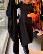 Elegante jurk in een effen kleur in de kleur Zwart voor dames in stijl ideaal voor de herfst.