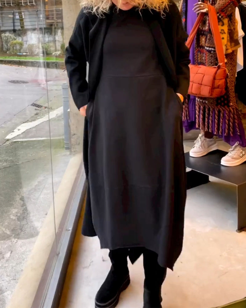 Elegante jurk in een effen kleur in de kleur Zwart voor dames in stijl ideaal voor de herfst.