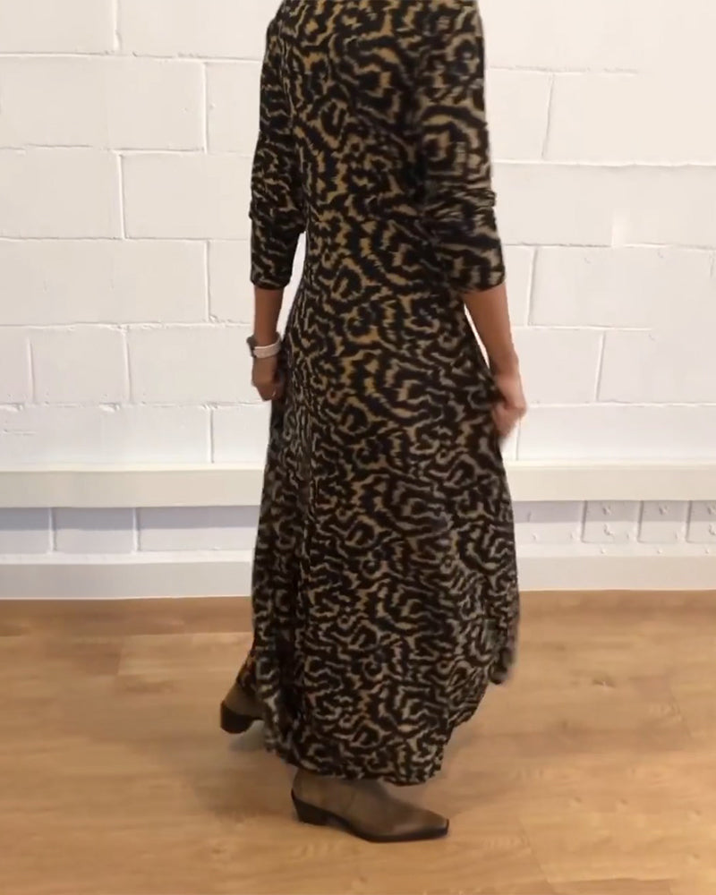 Elegante maxi jurk met lange mouwen in de kleur Zwart voor dames in stijl ideaal voor de herfst.