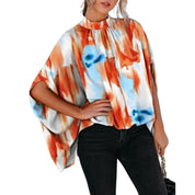 Genoveva | Blouse met abstracte prints in de kleur Oranje voor in stijl ideaal voor de lente.
