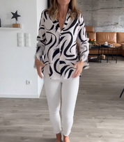 Herfstblousje met print in de kleur Wit voor dames in stijl ideaal voor de herfst.