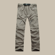 Ontdek de veelzijdige Jasper afritsbroek, de perfecte mix van comfort en functionaliteit, speciaal ontworpen als outdoor kleding voor heren. Deze broek is ideaal voor diverse activiteiten, van het bewandelen van paden tot het verkennen van nieuwe steden. De broek biedt een comfortabele pasvorm, premium kwaliteit en is praktisch voor verschillende weersomstandigheden. Met de mogelijkheid om eenvoudig te wisselen tussen een lange broek en shorts, ben je altijd optimaal gekleed.