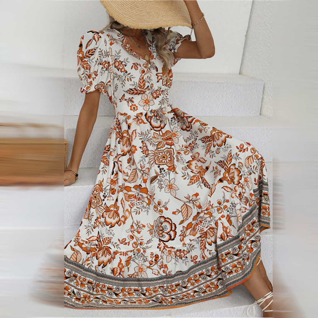 Julia | Stijlvolle Bloemenjurk in de kleur Oranje voor dames in stijl ideaal voor de zomer.