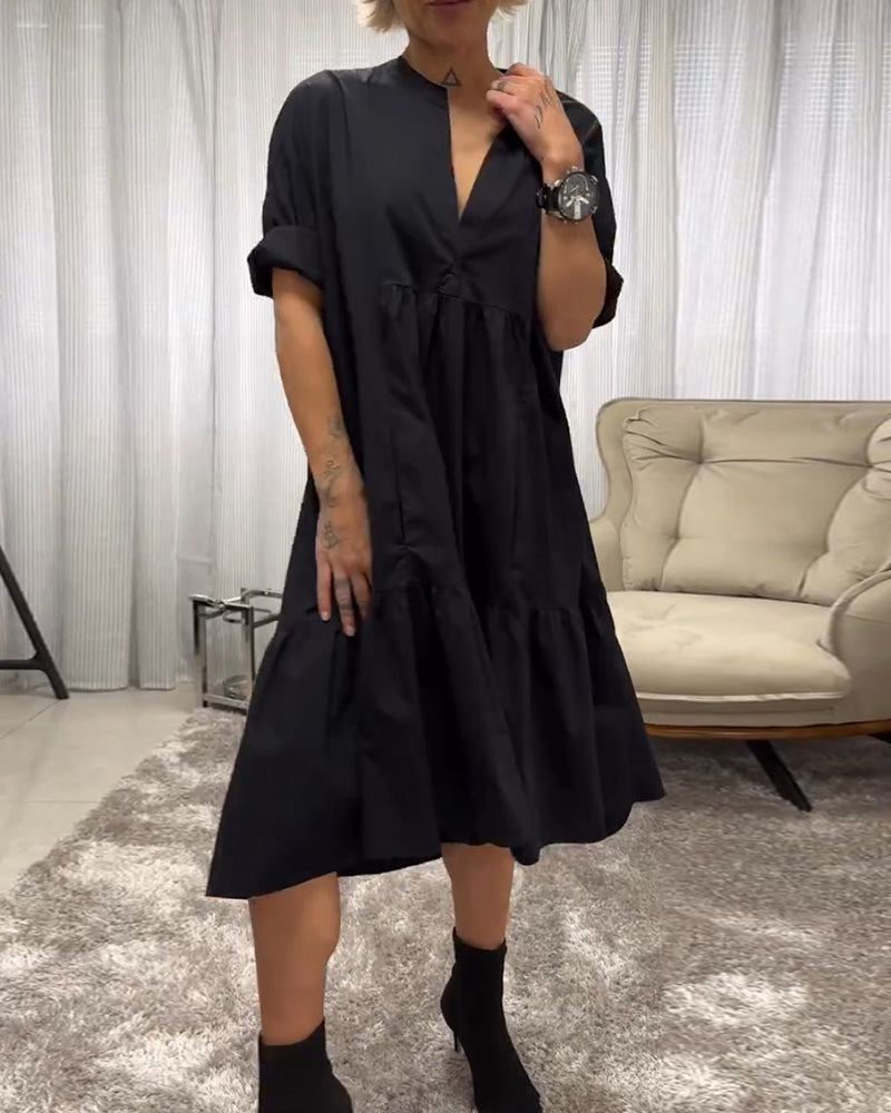 Jurk met 3/4 mouwen en diepe V-hals in de kleur Zwart voor dames in stijl ideaal voor de herfst.