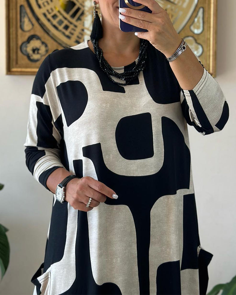 Jurk met lange mouwen en zwart witte print in de kleur Zwart voor dames in stijl ideaal voor de herfst.