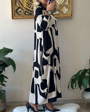 Jurk met lange mouwen en zwart witte print in de kleur Zwart voor dames in stijl ideaal voor de herfst.