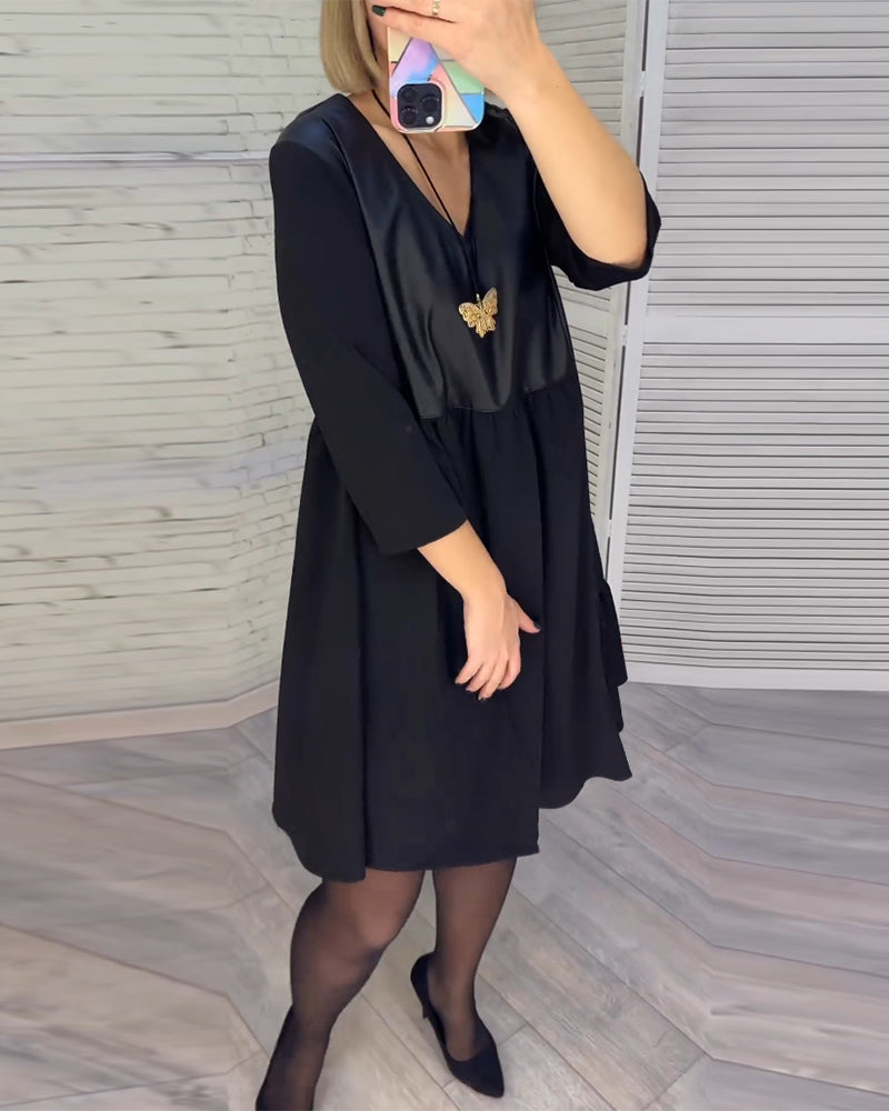 Jurk met patchwork en V-hals in de kleur Zwart voor dames in stijl ideaal voor de herfst.