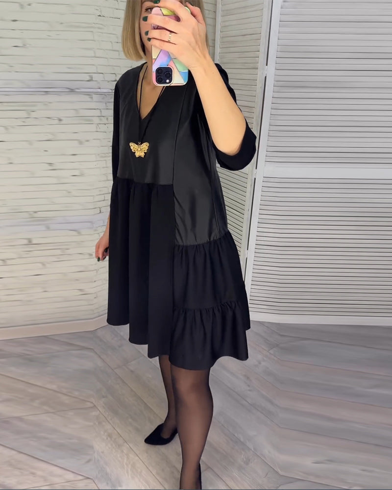 Jurk met patchwork en V-hals in de kleur Zwart voor dames in stijl ideaal voor de herfst.