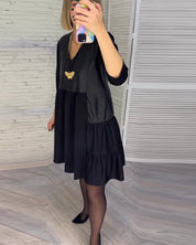 Jurk met patchwork en V-hals in de kleur Zwart voor dames in stijl ideaal voor de herfst.