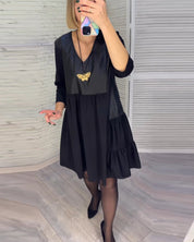 Jurk met patchwork en V-hals in de kleur Zwart voor dames in stijl ideaal voor de herfst.