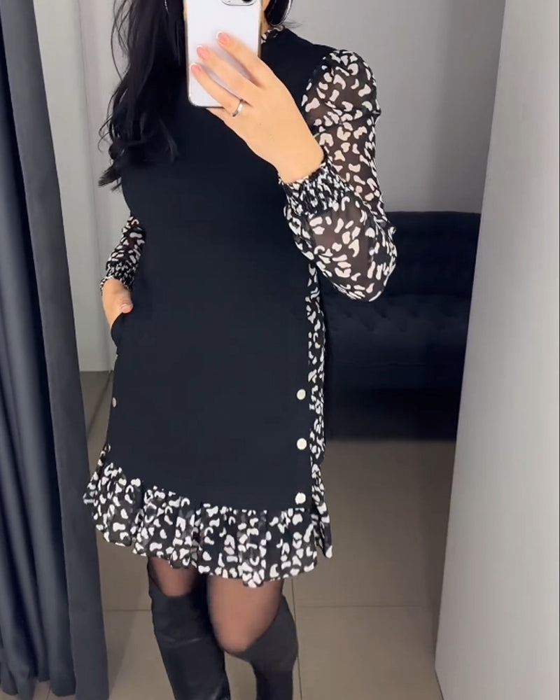 Jurk met patchworkzak en print in de kleur Zwart voor dames in stijl ideaal voor de herfst.