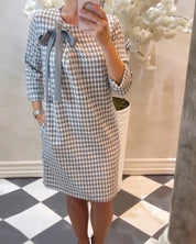 Jurk met patroon en elegante strik in de kleur Grijs voor dames in stijl ideaal voor de herfst.