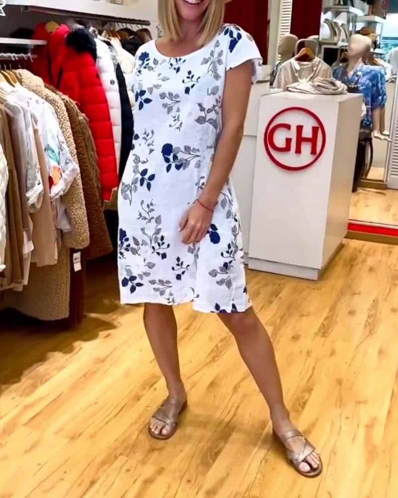 Jurk met zakken en bloemen patroon in de kleur Wit voor dames in stijl ideaal voor de lente.