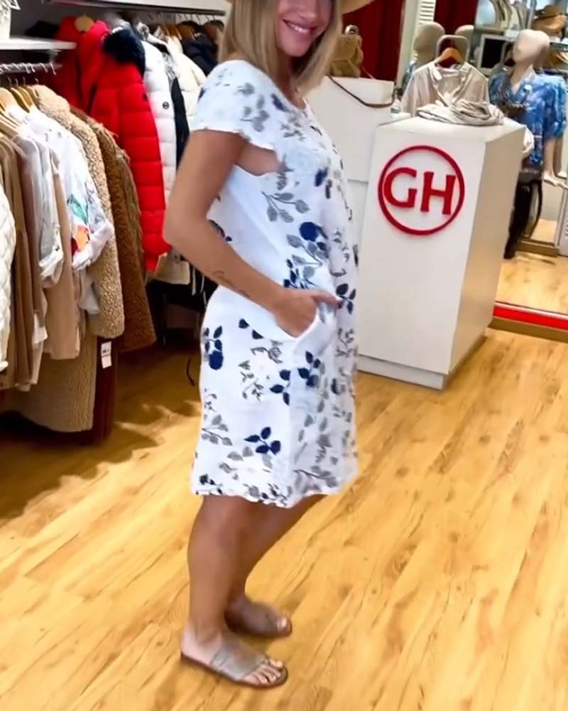 Jurk met zakken en bloemen patroon in de kleur Wit voor dames in stijl ideaal voor de lente.