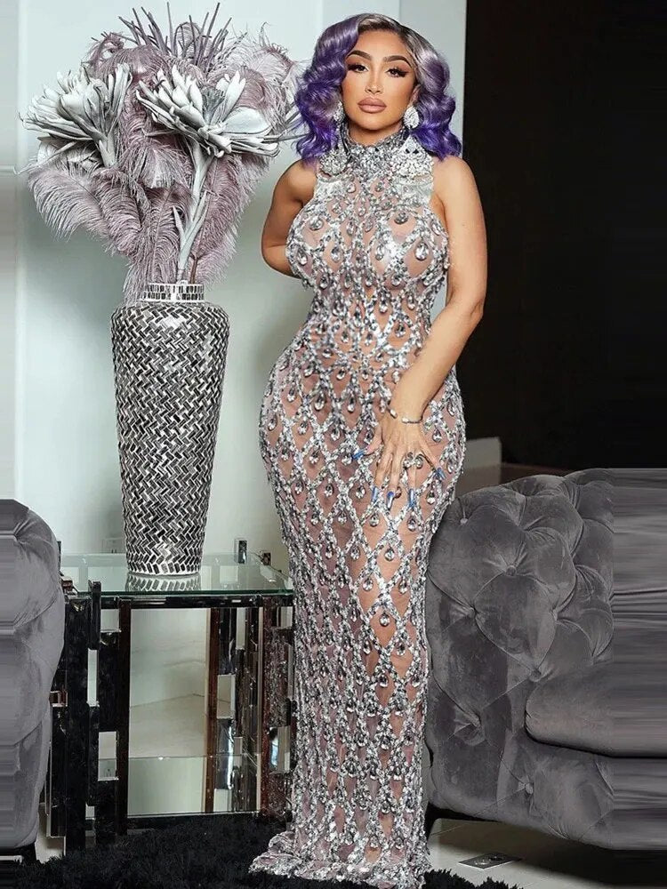 Laila | Prachtige mouwloze doorzichtige maxi feestjurk in de kleur Glitters voor dames in Party stijl ideaal voor de lente.