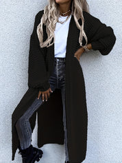Lange Cardigan Woman in de kleur Zwart voor dames in stijl ideaal voor de herfst.