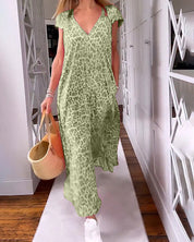 Lange jurk met korte mouwen en V-hals met print in de kleur Donkergroen voor dames in stijl ideaal voor de herfst.