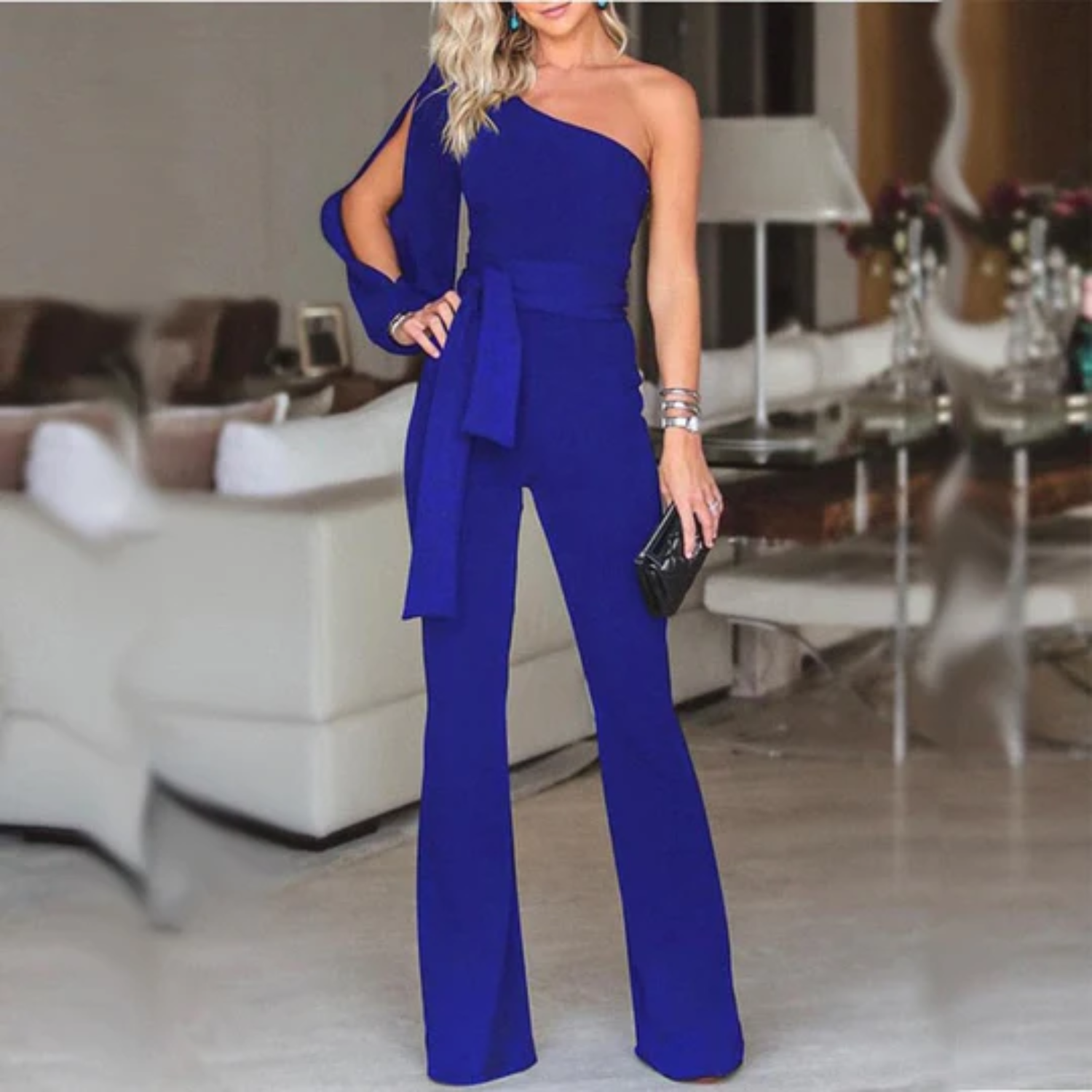 Liv | Stijlvolle dames jumpsuit met blote schouder in de kleur Blauw voor dames in Party stijl ideaal voor de lente.