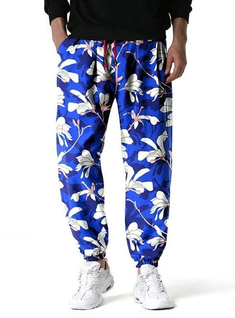 Loeka | Bloemenprint Joggingbroek met stijl in de kleur Blauw voor heren in Lounge stijl ideaal voor de lente.