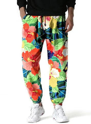 Loeka | Bloemenprint Joggingbroek met stijl in de kleur Geel voor heren in Lounge stijl ideaal voor de lente.
