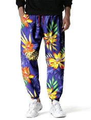 Loeka | Bloemenprint Joggingbroek met stijl in de kleur Koningsblauw voor heren in Lounge stijl ideaal voor de lente.