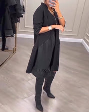 Lola | Artistieke jurk met V-hals en lange mouwen in de kleur Zwart voor dames in stijl ideaal voor de herfst.