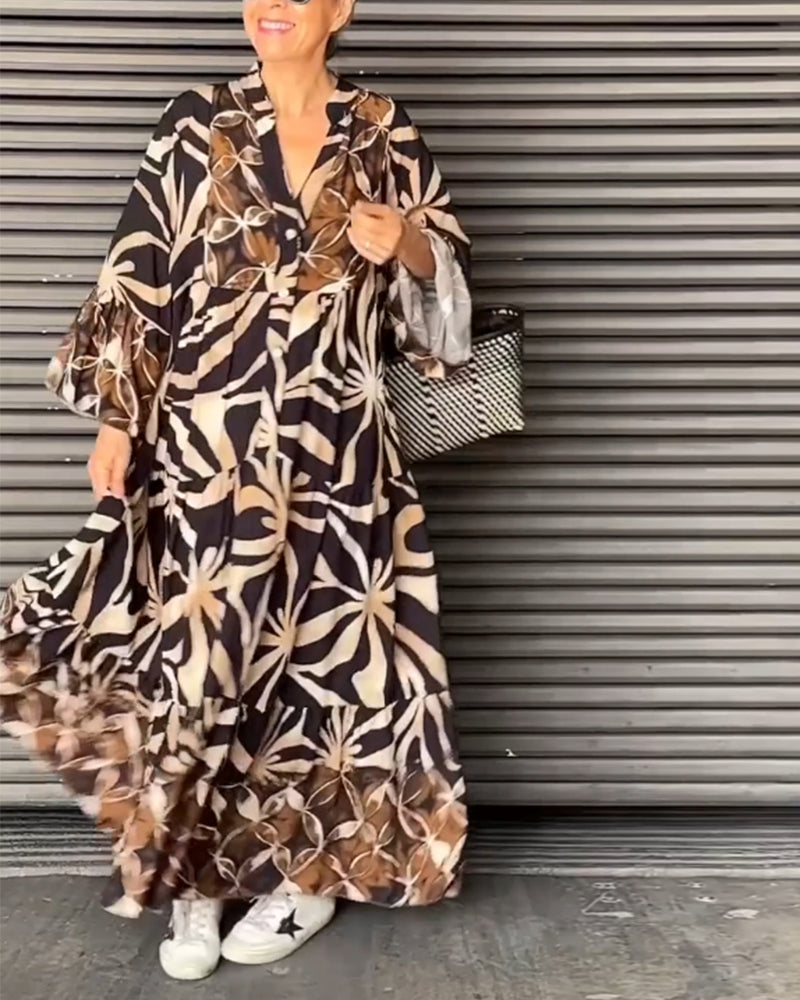 Loose fit bedrukte vakantiejurk in de kleur Zwart voor dames in stijl ideaal voor de lente.