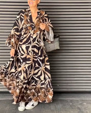 Loose fit bedrukte vakantiejurk in de kleur Zwart voor dames in stijl ideaal voor de lente.