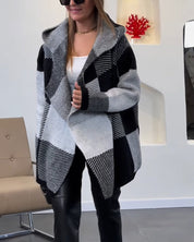 Losse jas met capuchon en kleurblokken in de kleur Zwart voor dames in stijl ideaal voor de herfst.