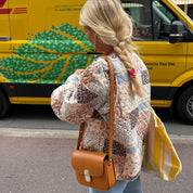 Lotte Vintage chique vest. in de kleur Beige voor dames in stijl ideaal voor de herfst.