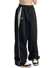 Lune | Retro wijde broek met trekkoord in de kleur Bruin voor dames in stijl ideaal voor de herfst.