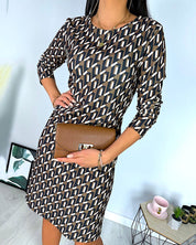 Marant | Elegante A-lijn jurk met ronde hals in de kleur Bruin voor dames in stijl ideaal voor de herfst.