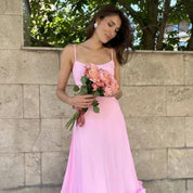 Miriam | Charmante midi-jurk met volants in de kleur Roze voor dames in stijl ideaal voor de lente.